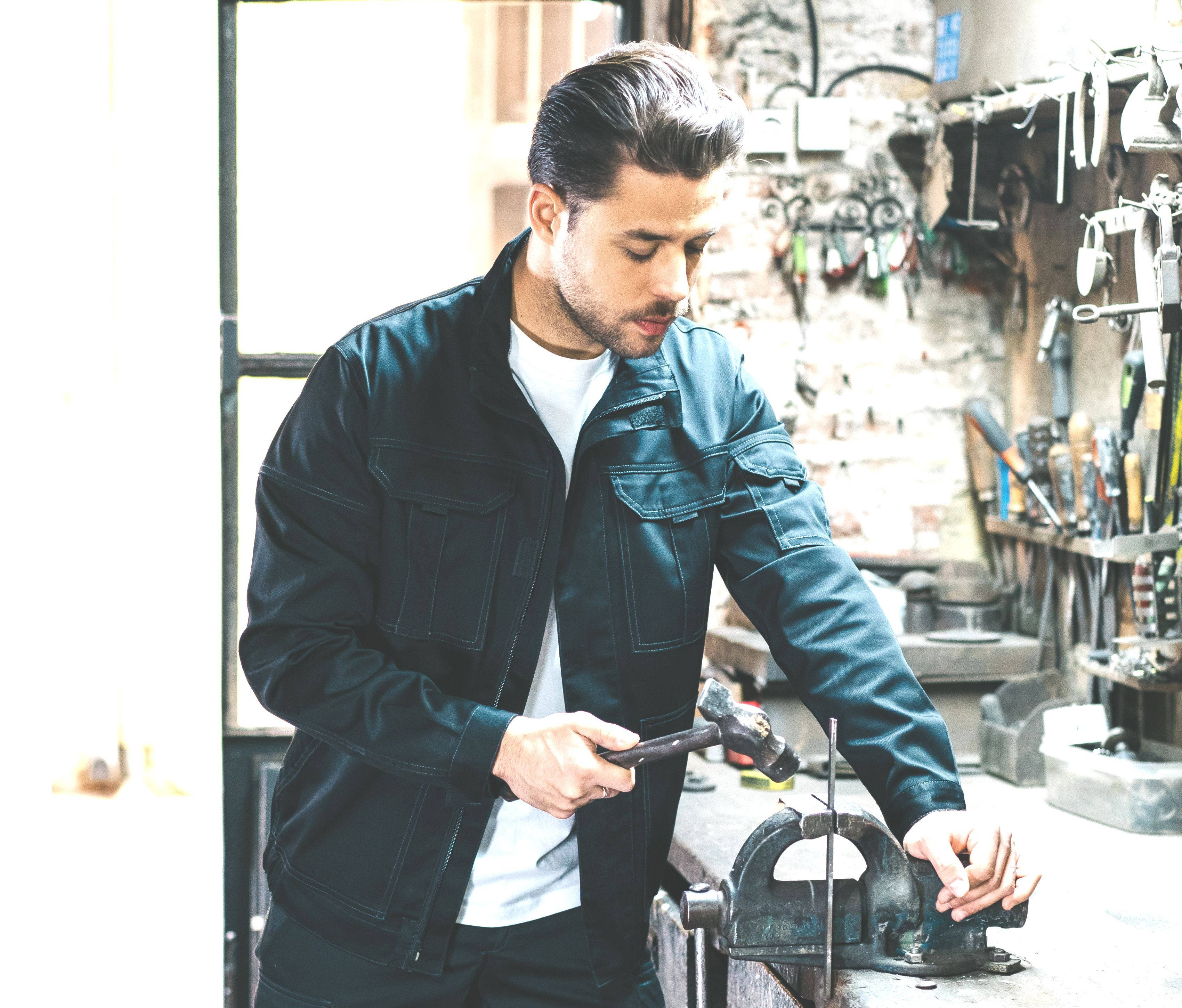 BLOUSON STRETCH MULTIPOCHES